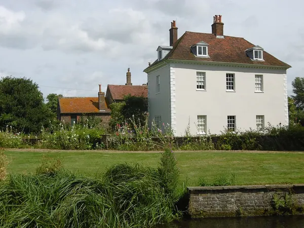 Georgian house at St John's Jerusalem seen across the River Darent at Sutton-at-Hone