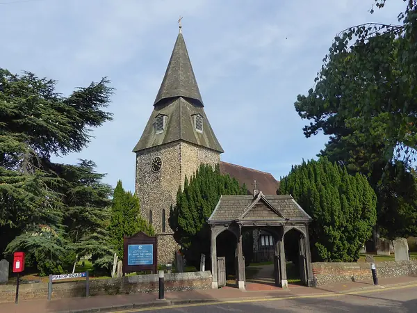 Octagonal shingled spire and timber lychgate of St Mary the Virgin, Bexley village