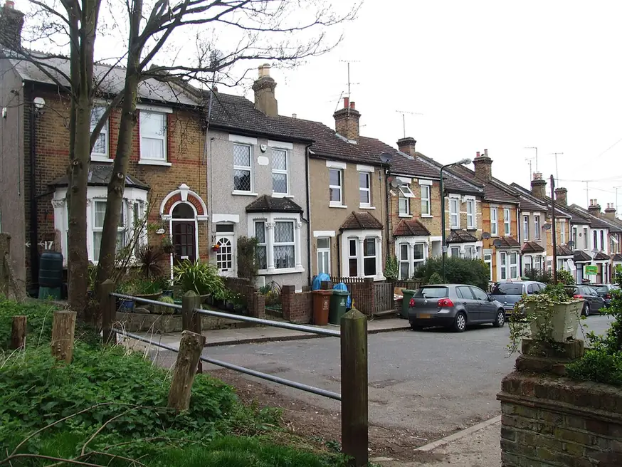 Victorian terraced houses with bay windows and chimney stacks on Glendale Road, Erith